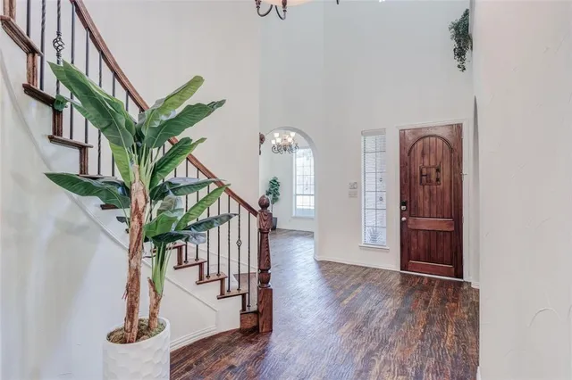 a view of front door with staircase