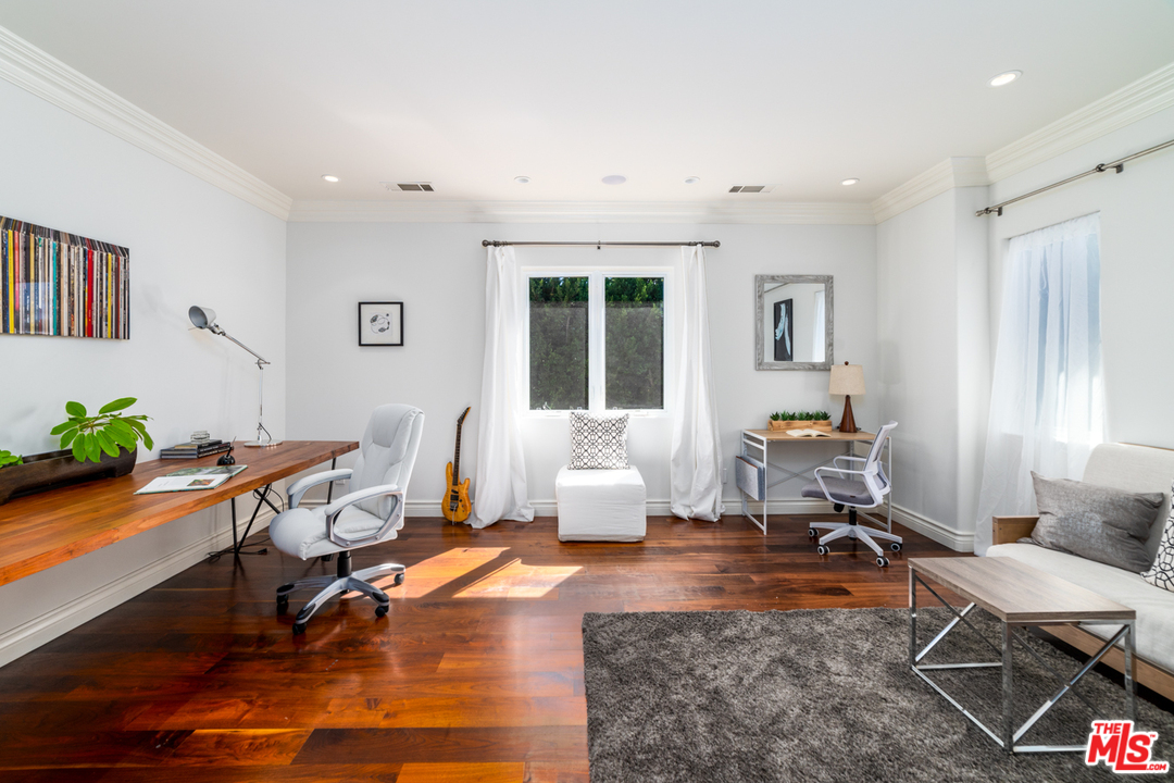 1236 Stradella Road Los Angeles, CA 90077 - Photo 19 of 26 a room with furniture or couch and a window