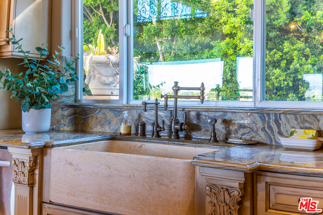 1236 Stradella Road Los Angeles, CA 90077 - Photo 8 of 26 a kitchen with a sink and a large window