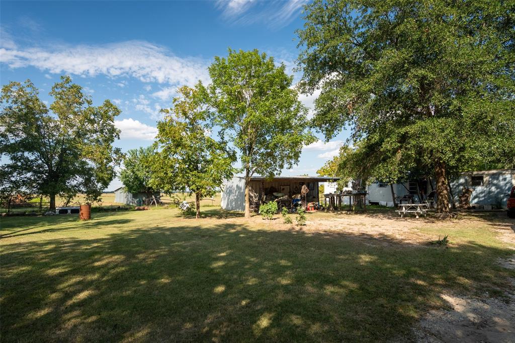 814 Signal Road Quinlan, TX 75474 - Photo 5 of 20 a view of a outdoor space with a house