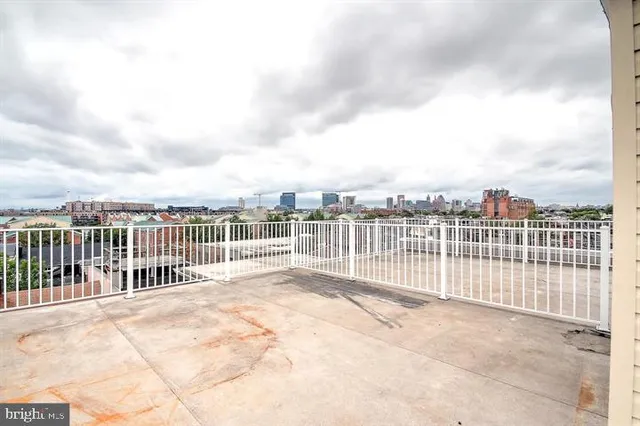 a view of a balcony with city view