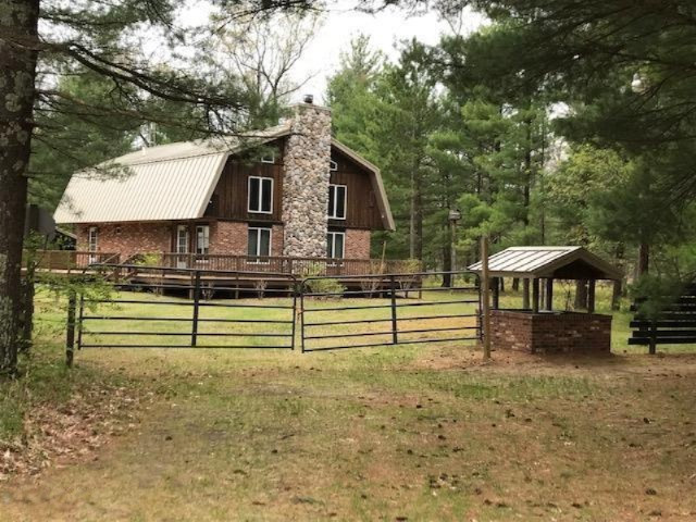 1206 Skocelas Road North Manistee, MI 49660 - Photo 3 of 37 1206 Skocolas gate view