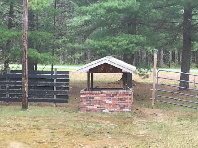 1206 Skocelas Road North Manistee, MI 49660 - Photo 34 of 37 1206 Skocolas front gate from deck