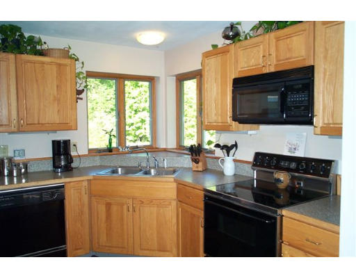 60 Warren Road Brimfield, MA 01010 - Photo 3 of 6 a kitchen with a sink a stove and cabinets