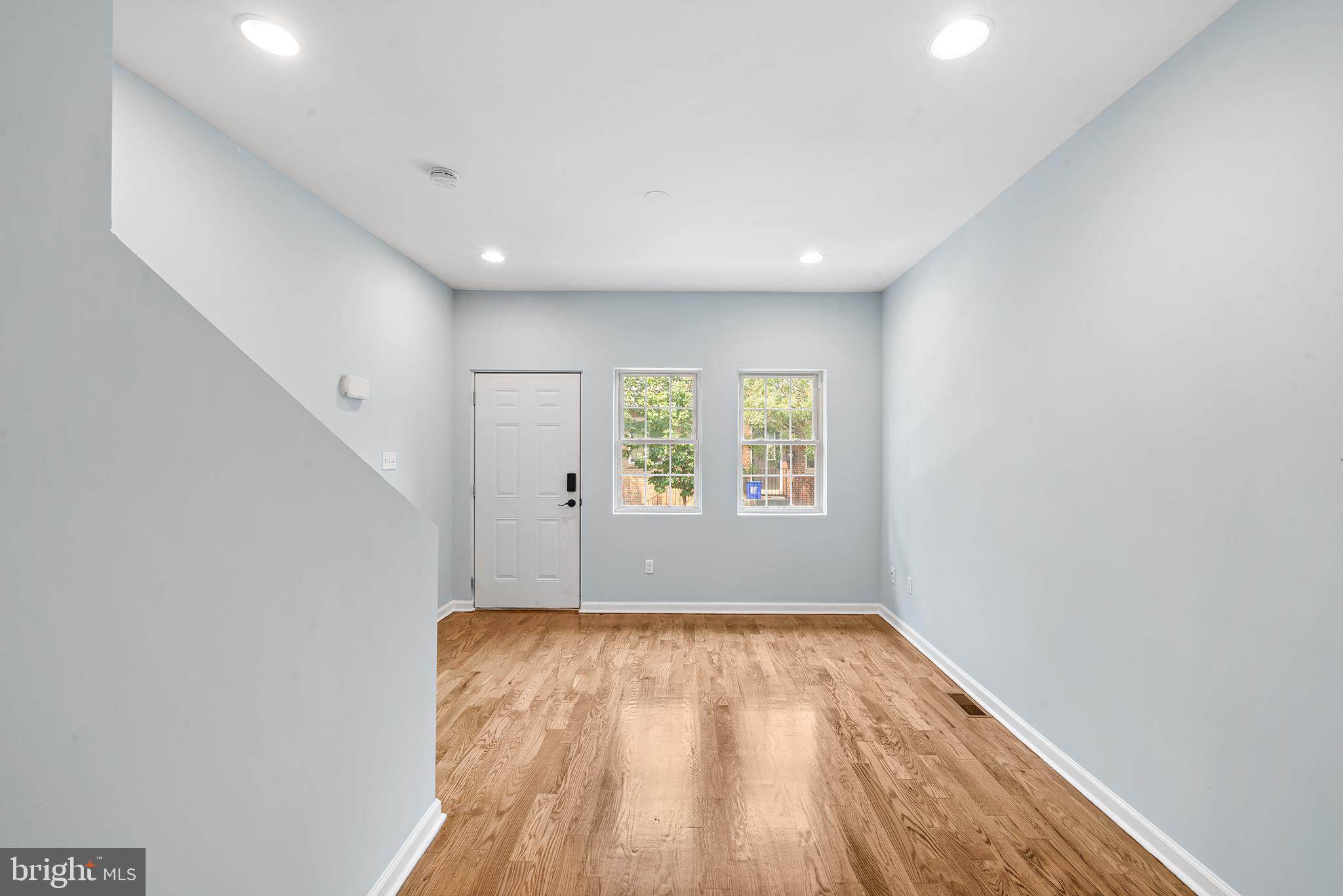 1904 Manton Street Philadelphia, PA 19146 - Photo 10 of 31 wooden floor in an empty room with a window