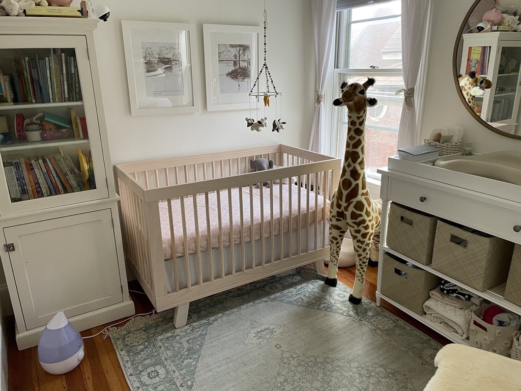 9 Oakview Terrace Boston, MA 02130 - Photo 7 of 9 a bedroom with furniture and a window