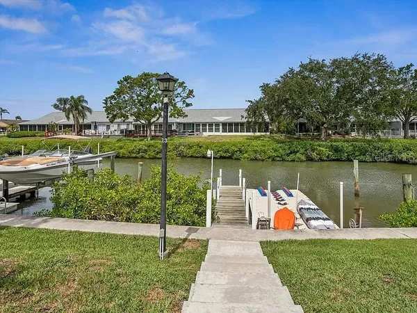 a lake view with a bench in the background