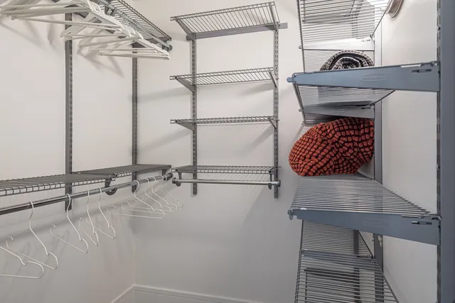 a view of a balcony with wooden floor