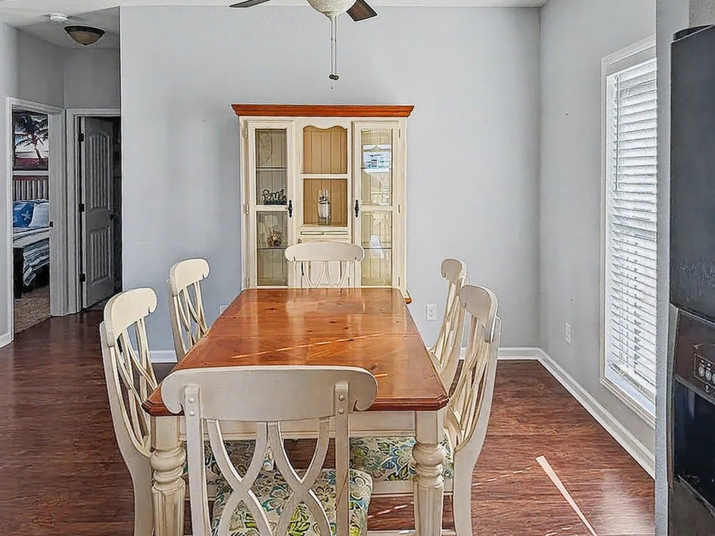 175 Ellen Lane Decaturville, TN 38329 - Photo 10 of 25 a view of a dining room with furniture window and wooden floor