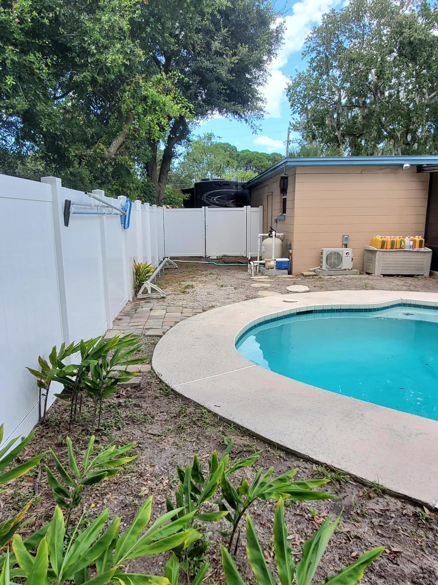 1064 Halifax Road Jacksonville, FL 32216 - Photo 26 of 31 right side yard (pool equip.)