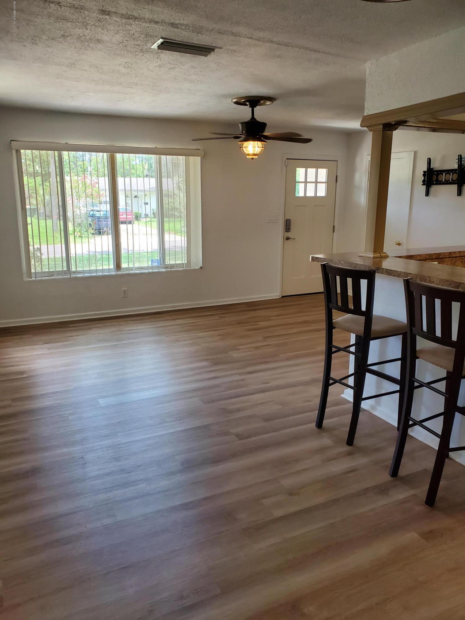 1064 Halifax Road Jacksonville, FL 32216 - Photo 9 of 31 Dining Room to Living Room