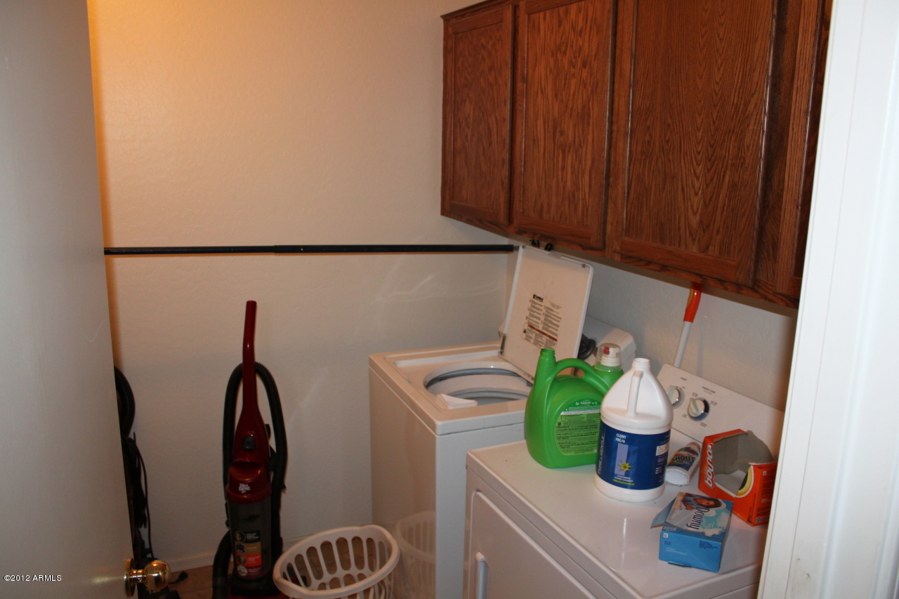 2425 West Apollo Road Phoenix, AZ 85041 - Photo 11 of 22 Laundry Room with built in cabinets