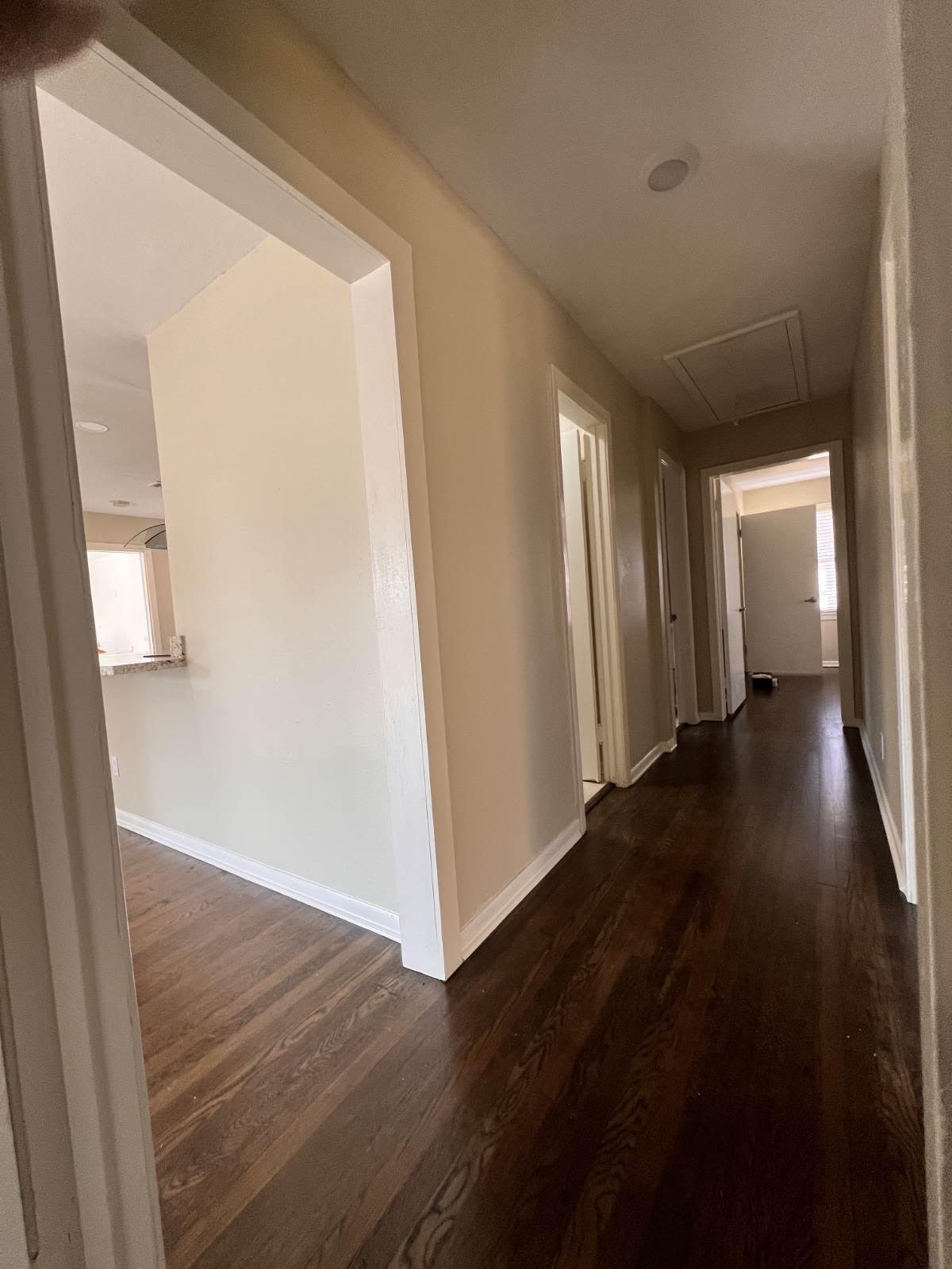 5834 Indigo Street Houston, TX 77074 - Photo 7 of 15 a view of a hallway with wooden floor