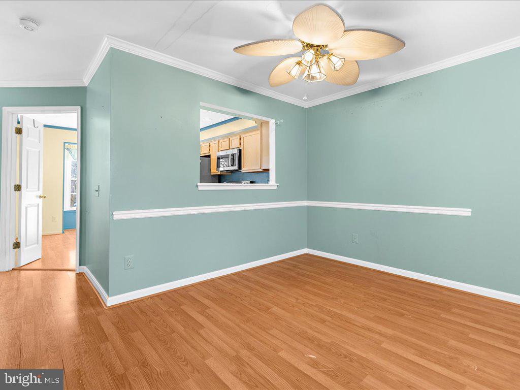 266 St Michaels Circle Odenton, MD 21113 - Photo 18 of 42 a view of empty room with wooden floor