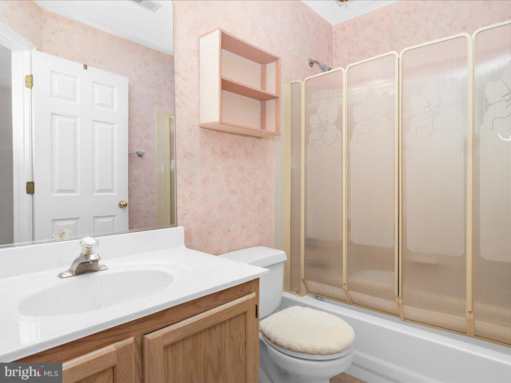 266 St Michaels Circle Odenton, MD 21113 - Photo 20 of 42 a bathroom with a sink toilet and shower