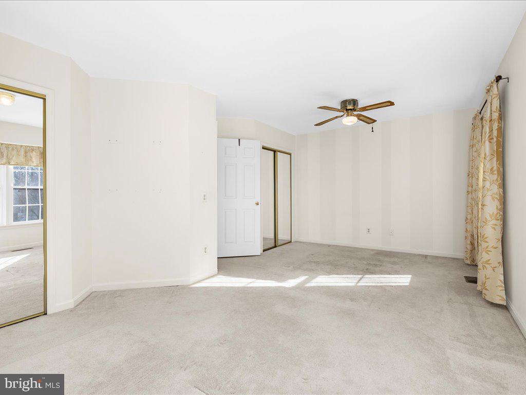 266 St Michaels Circle Odenton, MD 21113 - Photo 26 of 42 a view of empty room with windows