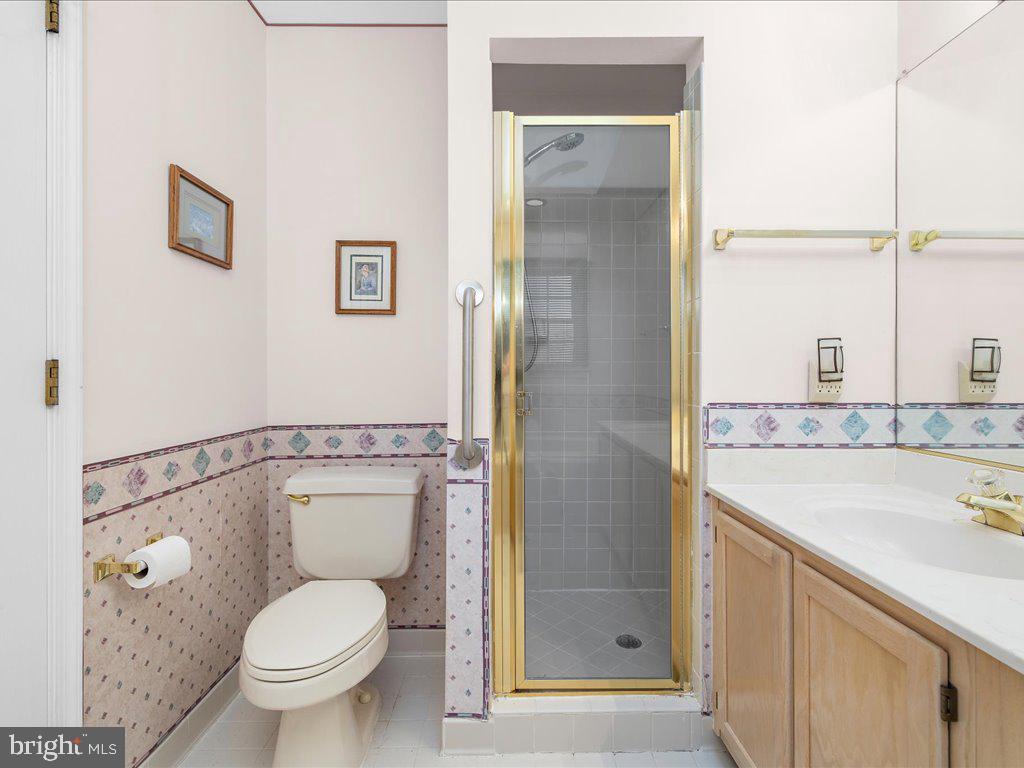 266 St Michaels Circle Odenton, MD 21113 - Photo 34 of 42 a bathroom with a granite countertop sink toilet and shower