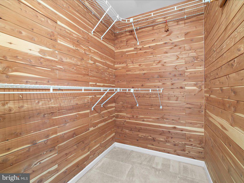266 St Michaels Circle Odenton, MD 21113 - Photo 35 of 42 a view of a room with racks on the wall