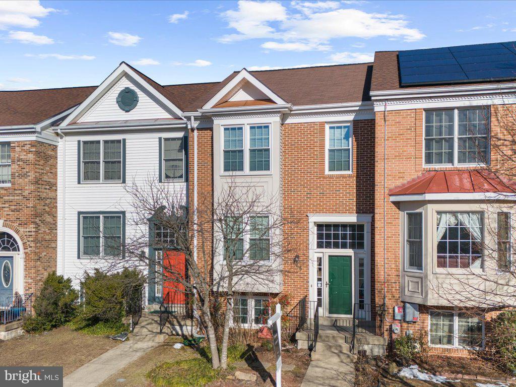 266 St Michaels Circle Odenton, MD 21113 - Photo 4 of 42 a front view of residential houses with yard