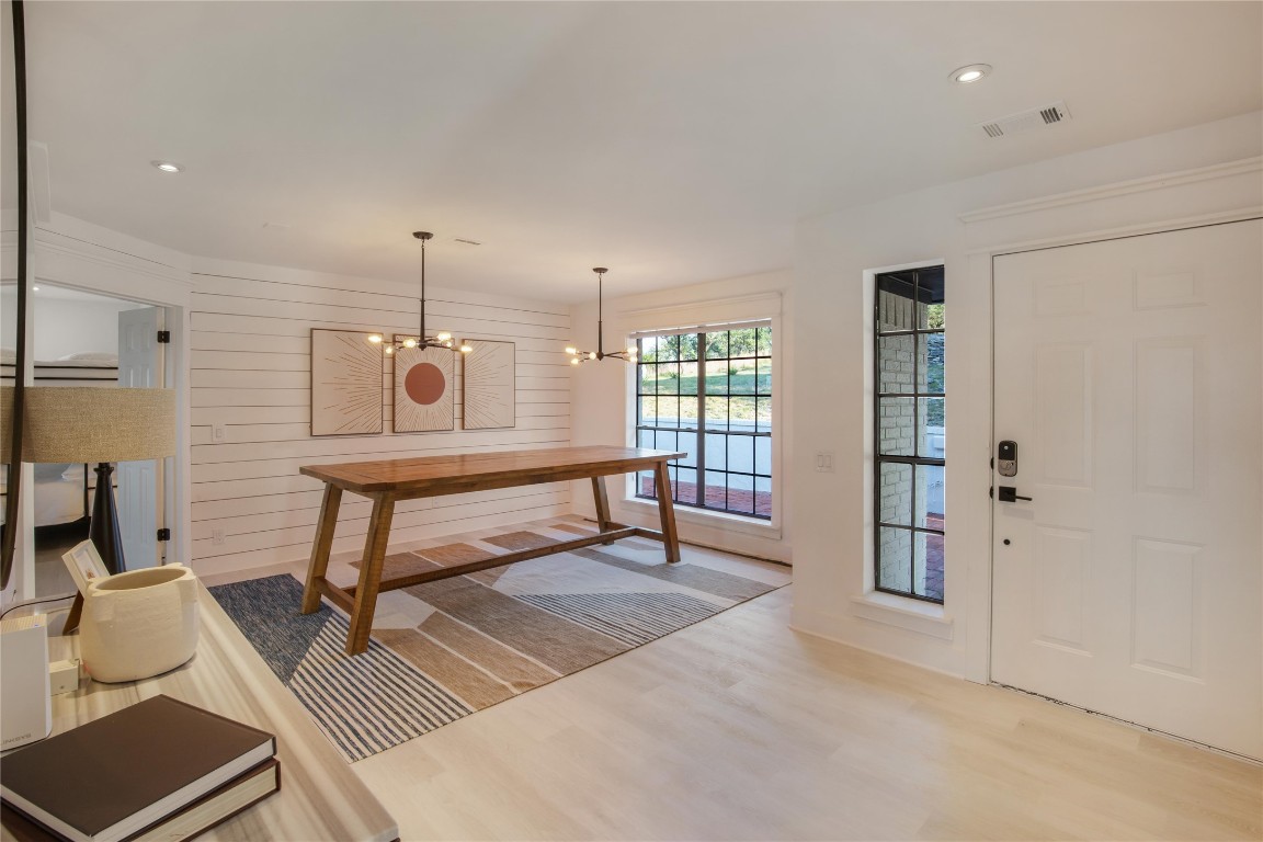 171 Hart Lane Dripping Springs, TX 78620 - Photo 15 of 40 a living room with a couch and two windows
