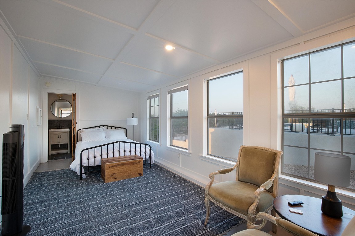 171 Hart Lane Dripping Springs, TX 78620 - Photo 34 of 40 a living room with furniture and a window