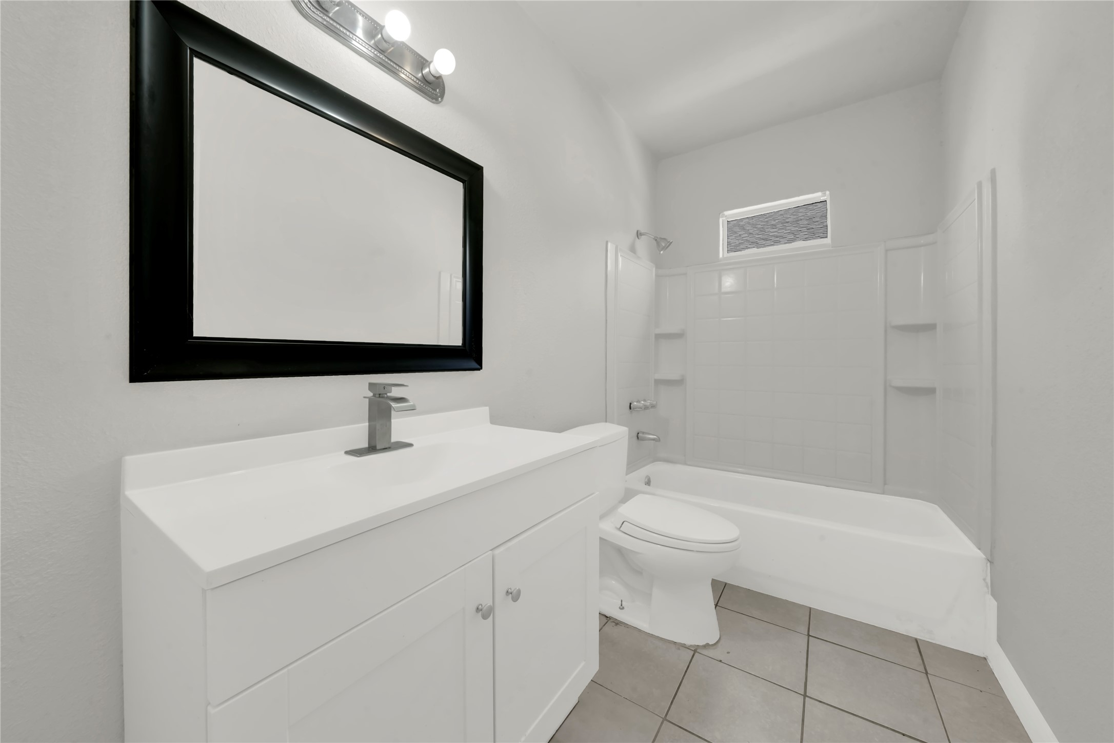 106 Hanover Street Houston, TX 77012 - Photo 15 of 49 a bathroom with a toilet sink and mirror