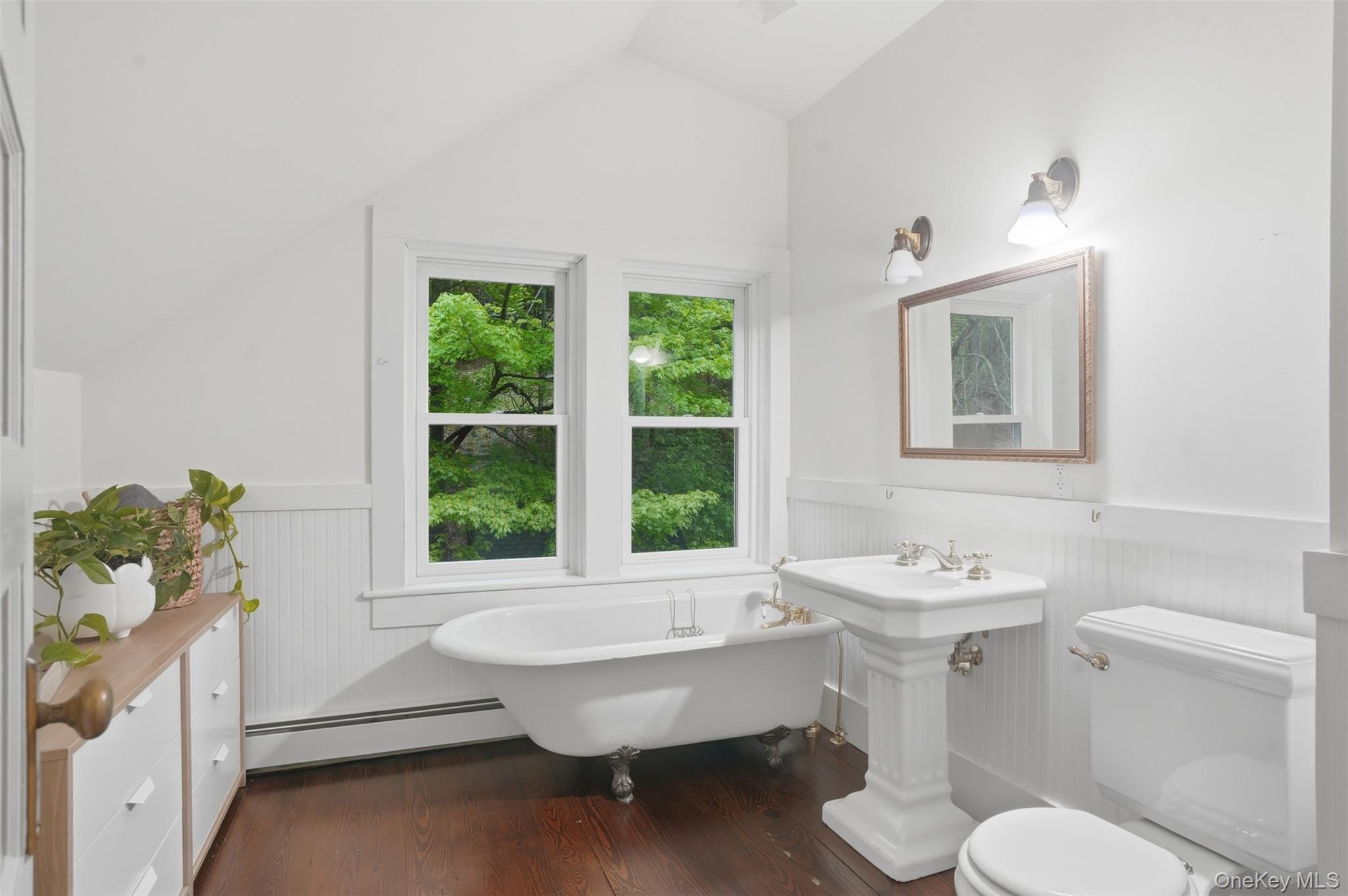 726 Wittenberg Road Mount Tremper, NY 12457 - Photo 24 of 32 a bathroom with a sink toilet and a window