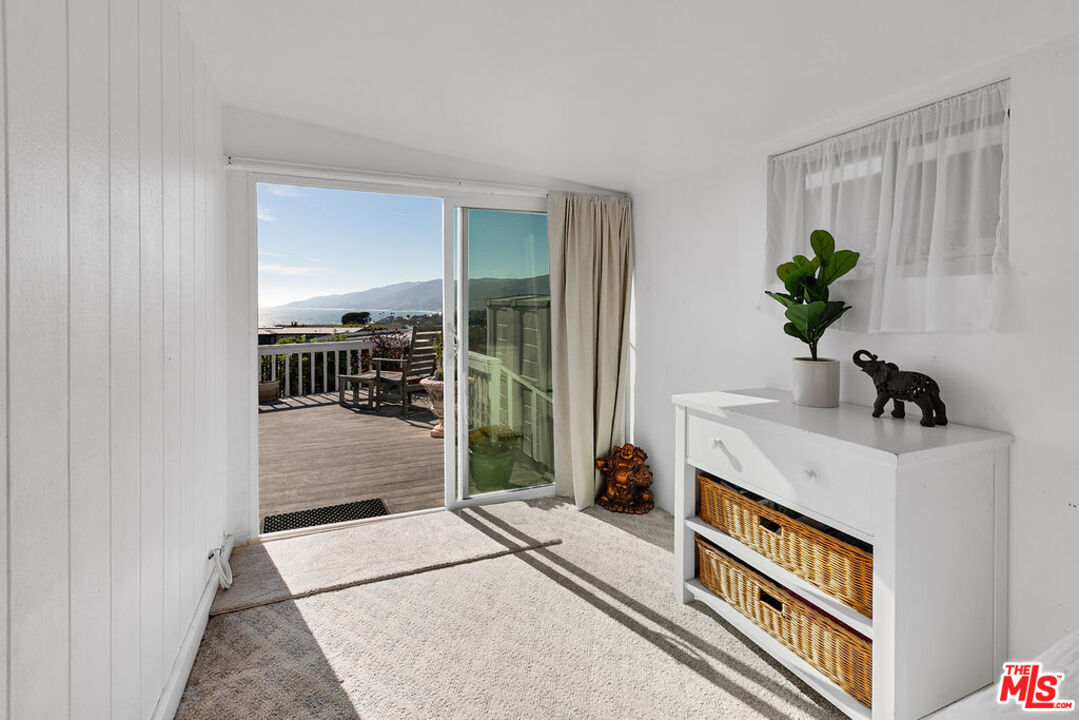 29500 Heathercliff Road, Unit 252 Malibu, CA 90265 - Photo 17 of 50 a very nice looking room with a large window