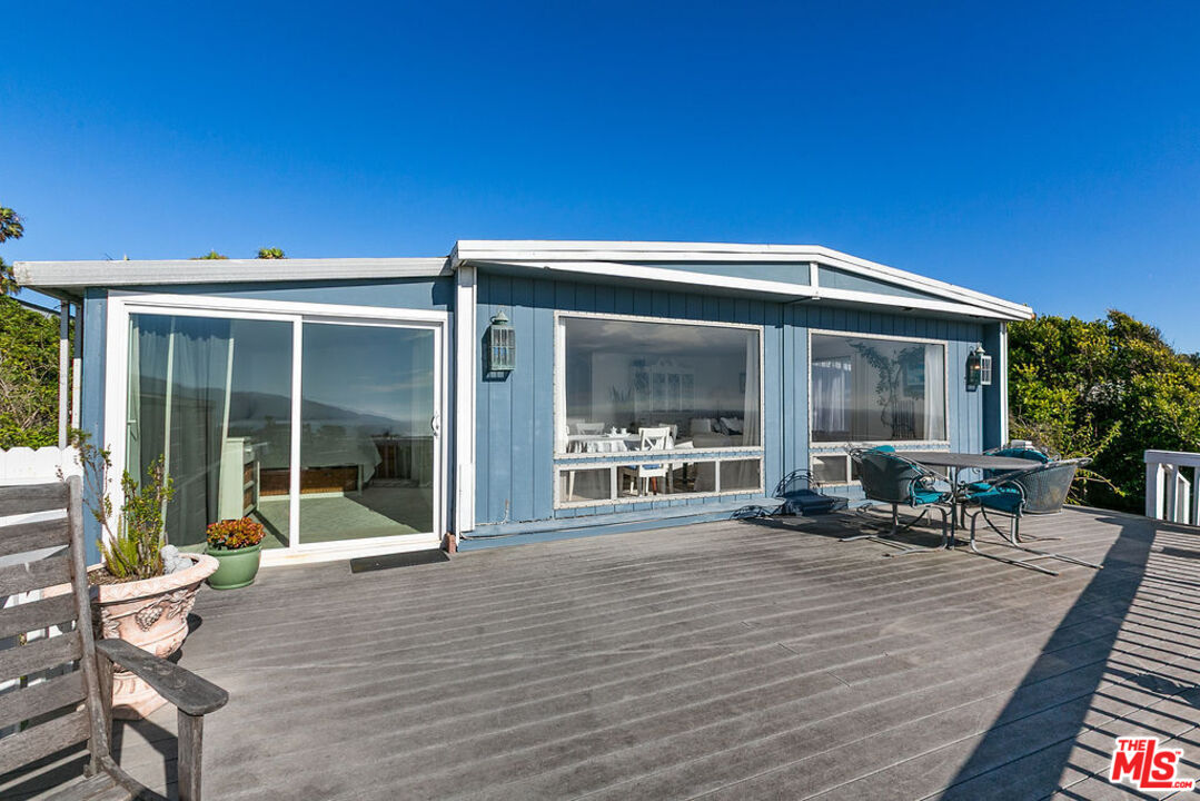 29500 Heathercliff Road, Unit 252 Malibu, CA 90265 - Photo 34 of 50 a view of a house with lounge chair