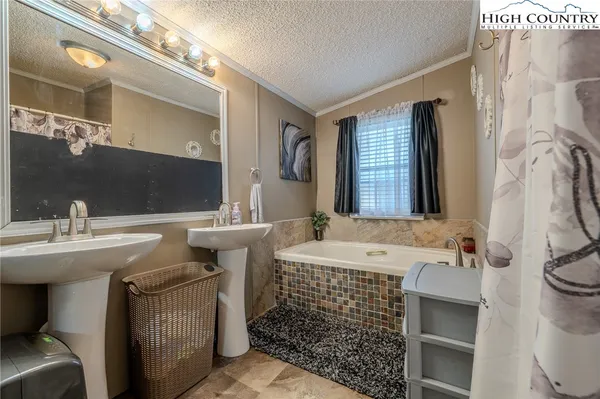 a bathroom with a sink and a bathtub