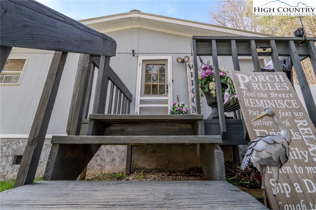 672 Upper Hanging Rock Road Spruce Pine, NC 28777 - Photo 4 of 22 a view of front door of house