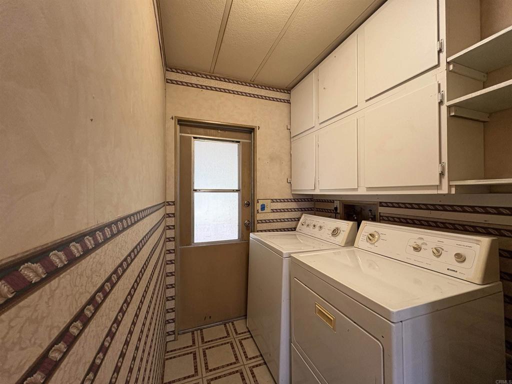 7467 Mission Gorge Road, Unit 293 Santee, CA 92071 - Photo 15 of 49 a utility room with dryer and washer