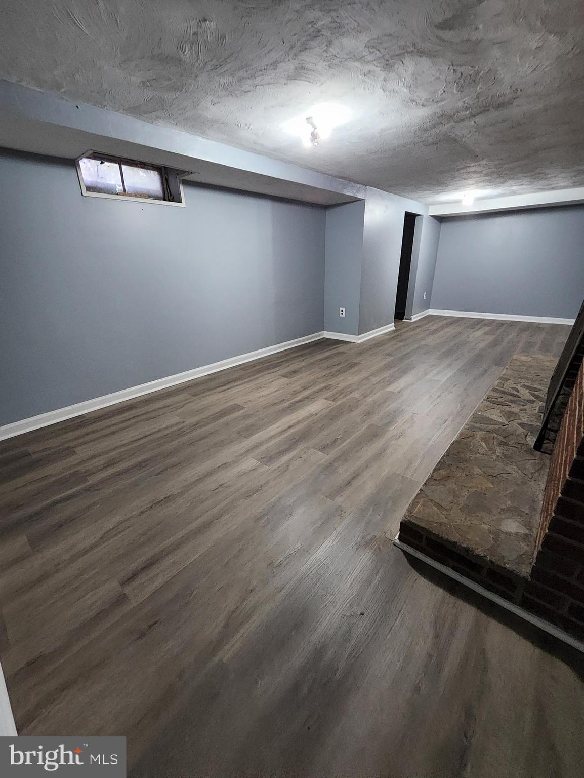 13723 Dumfries Road Manassas, VA 20112 - Photo 19 of 21 an empty room with wooden floor