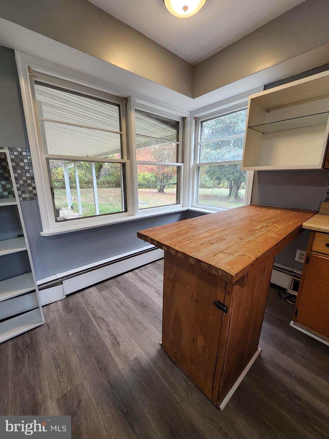 13723 Dumfries Road Manassas, VA 20112 - Photo 9 of 21 an outdoor space with wooden floor and a window