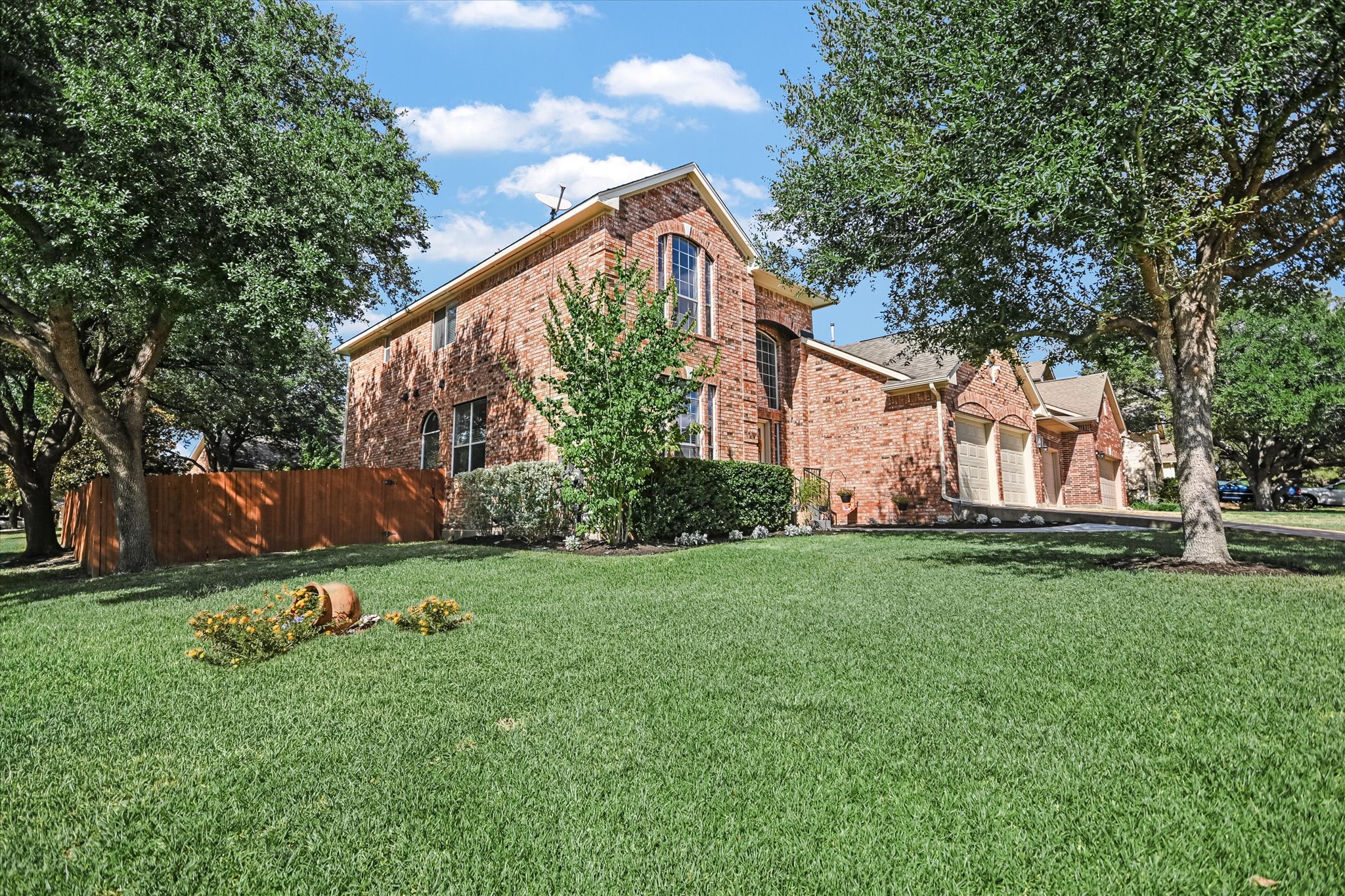 This beautifully updated two-story home sits on a desirable corner lot with inviting curb appeal.