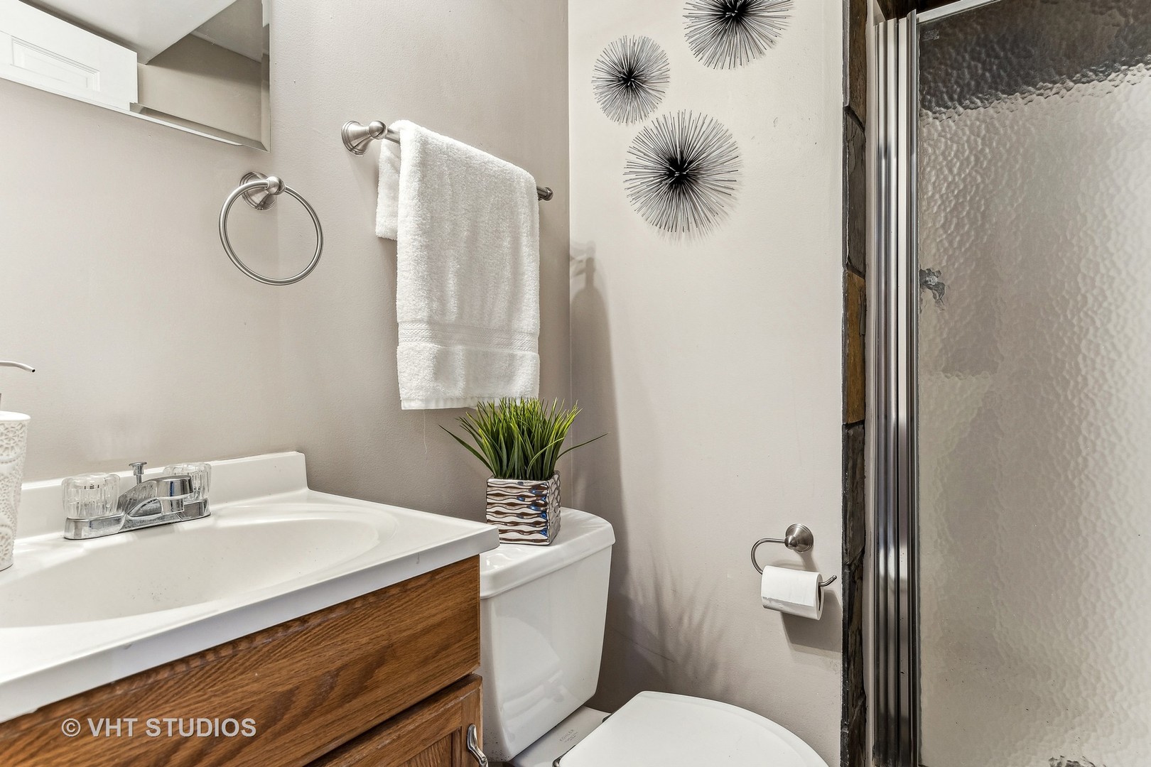 337 Cedarbrook Road Naperville, IL 60565 - Photo 21 of 37 a bathroom with a sink toilet and shower