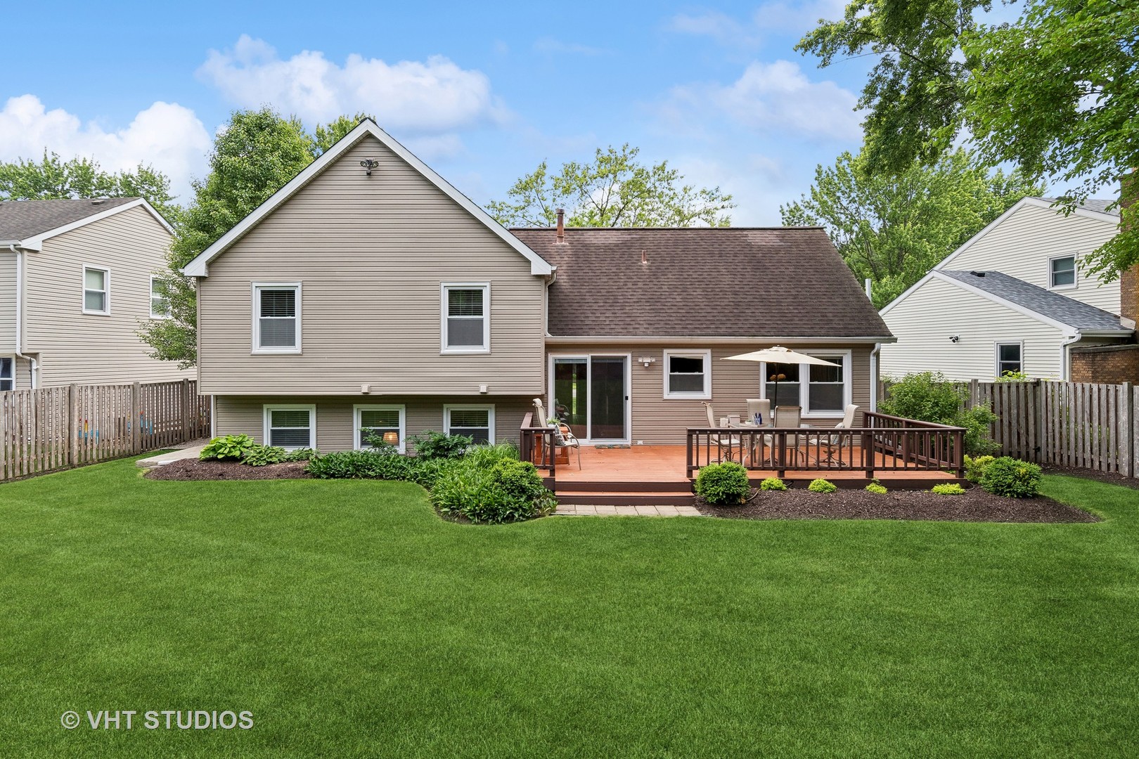 337 Cedarbrook Road Naperville, IL 60565 - Photo 25 of 37 a front view of house with yard and green space