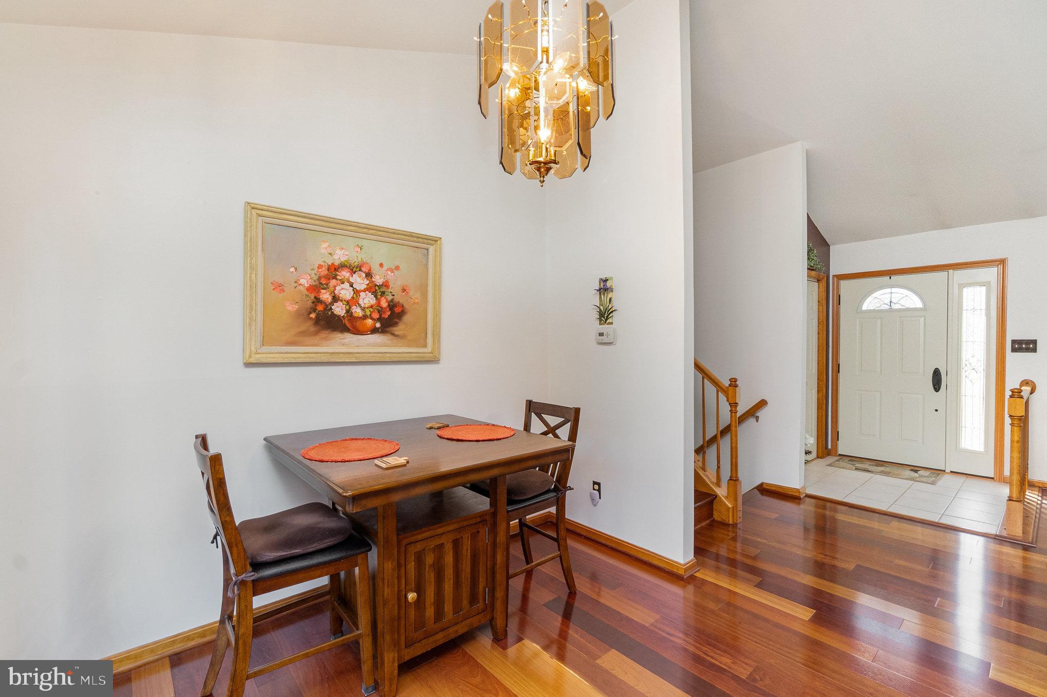 316 Hitching Post Drive Rising Sun, MD 21911 - Photo 5 of 42 a view of a dining room with furniture and wooden floor