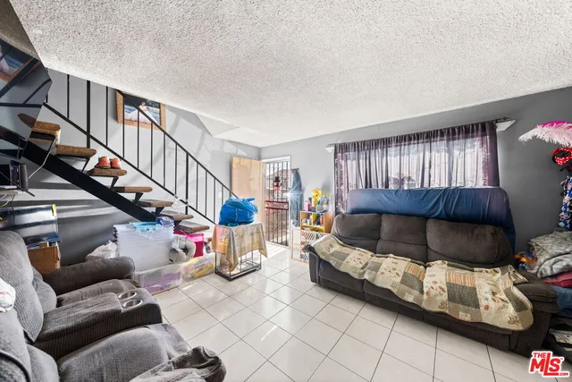 a bed room with a bed and a desk