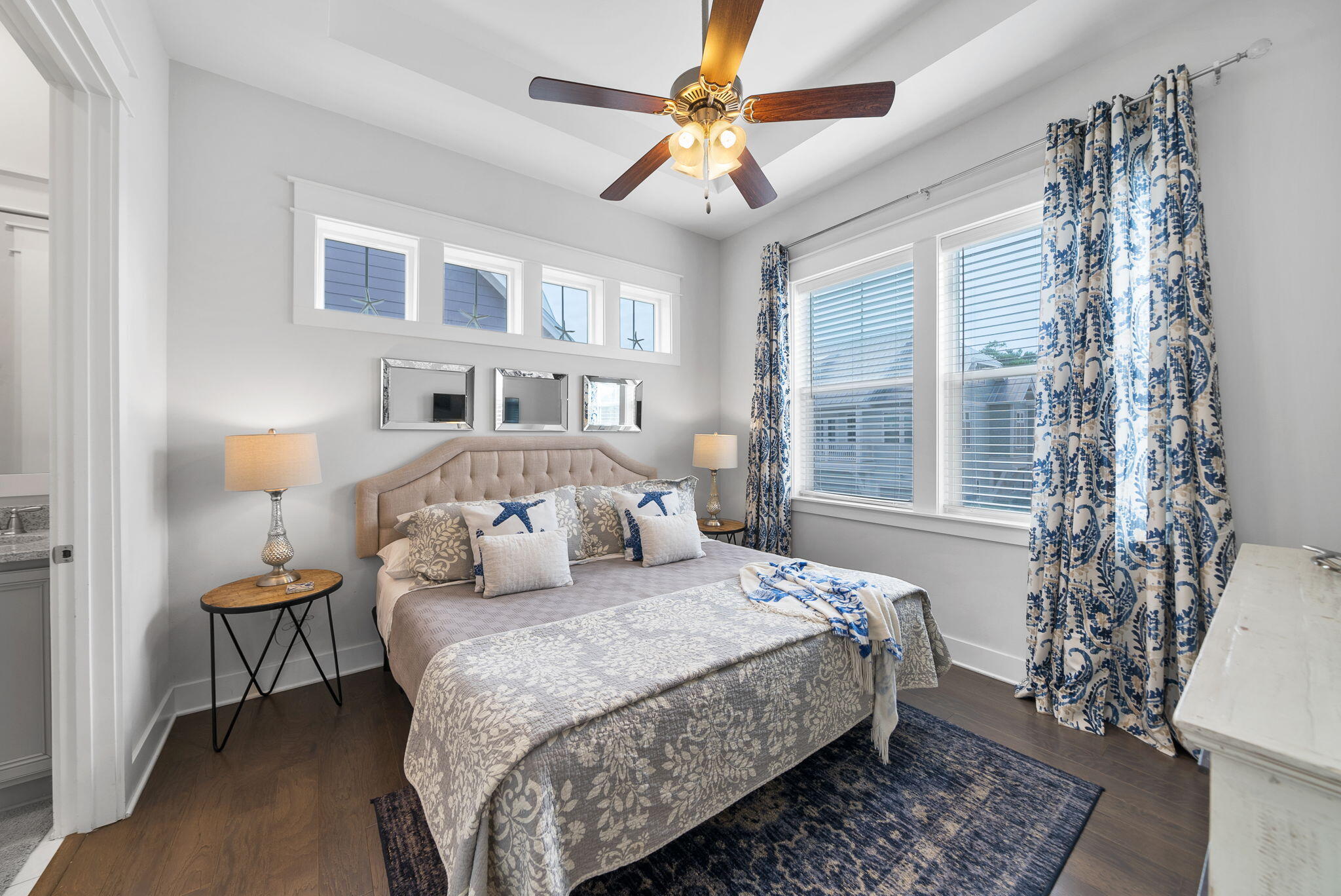 11 East E Pine, Unit C Inlet Beach, FL 32461 - Photo 16 of 40 a bedroom with a bed and a chandelier