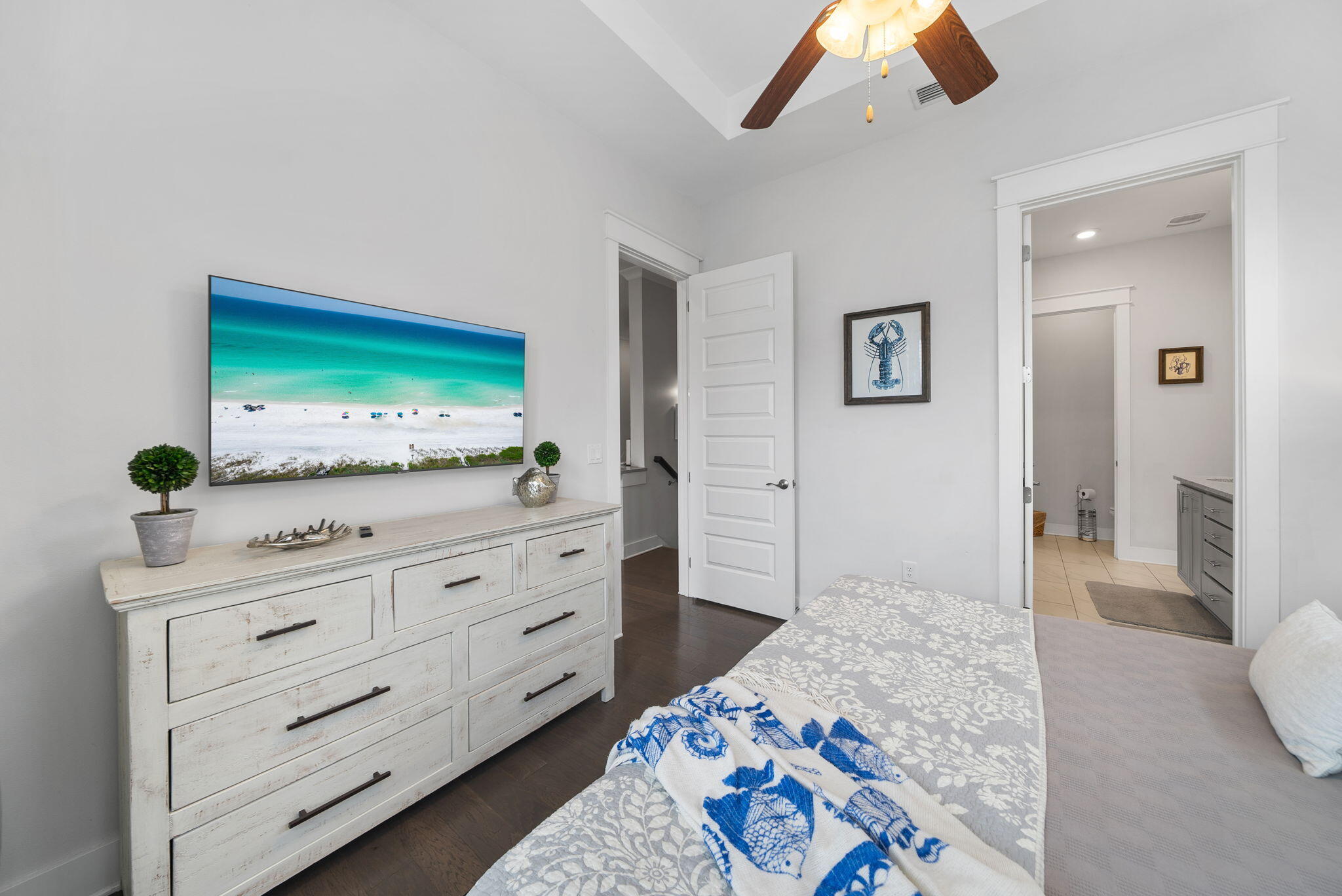 11 East E Pine, Unit C Inlet Beach, FL 32461 - Photo 17 of 40 a bedroom with a bed and a dresser in it