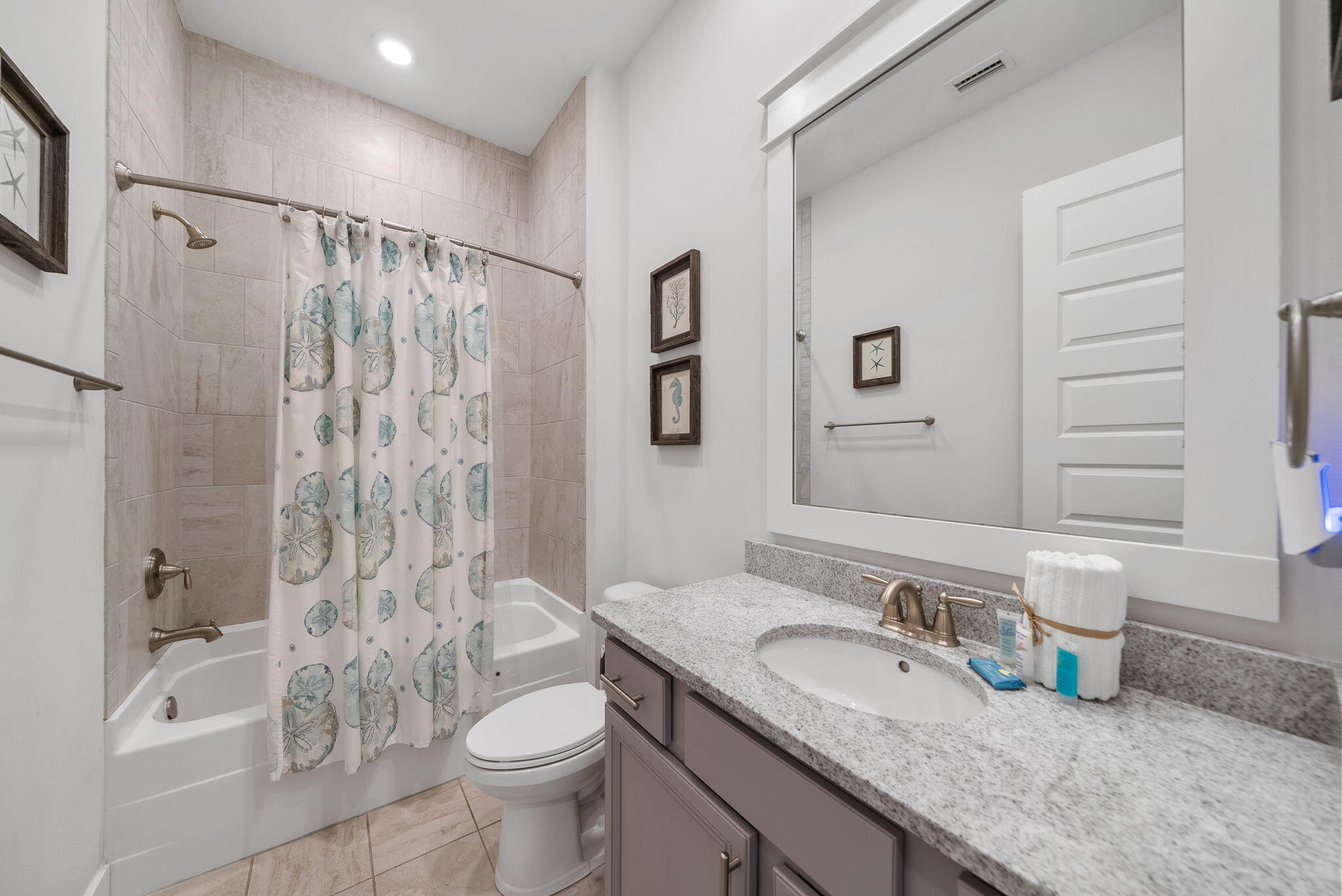 11 East E Pine, Unit C Inlet Beach, FL 32461 - Photo 18 of 40 a bathroom with a granite countertop sink toilet and shower
