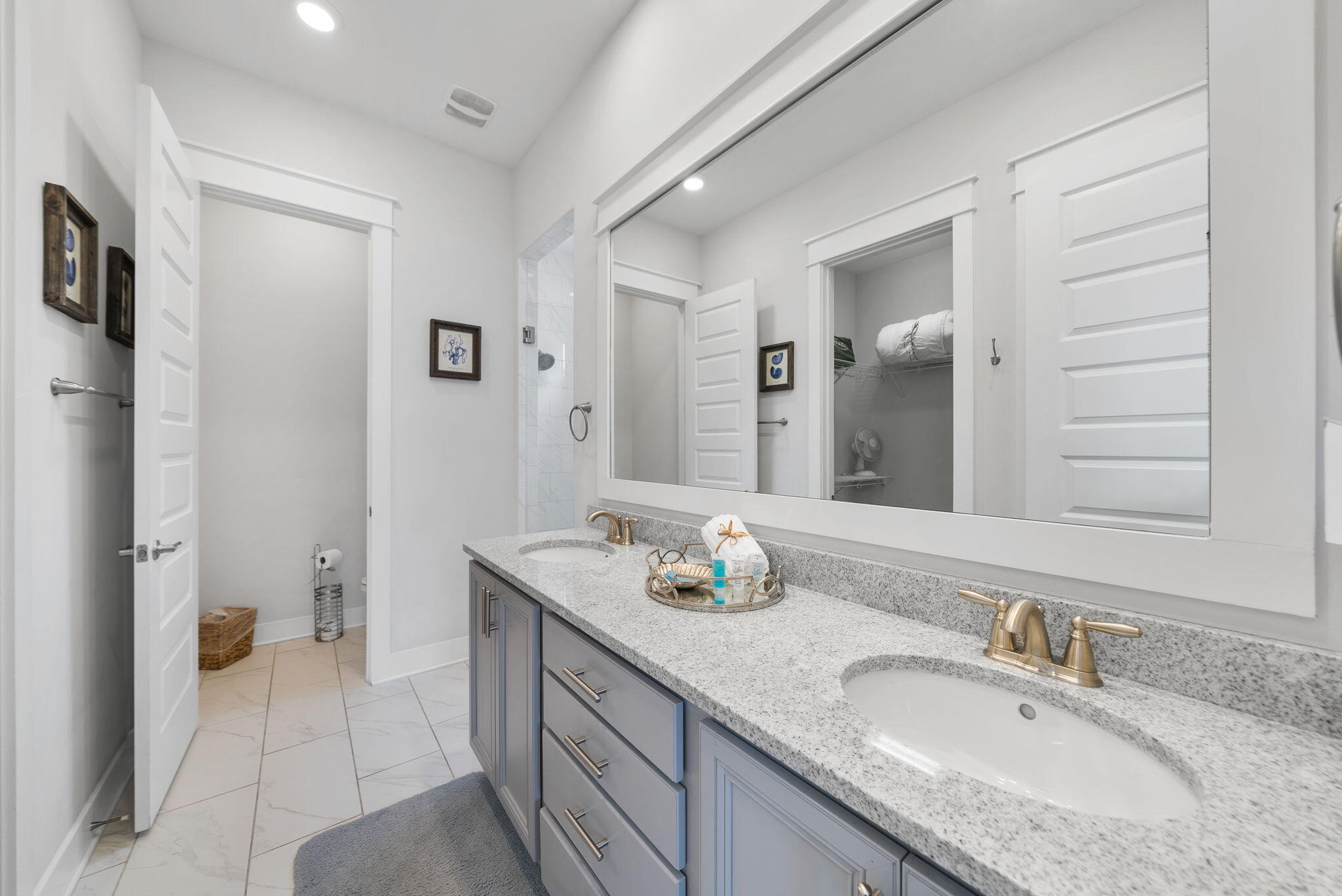 11 East E Pine, Unit C Inlet Beach, FL 32461 - Photo 19 of 40 a bathroom with a granite countertop sink and a mirror