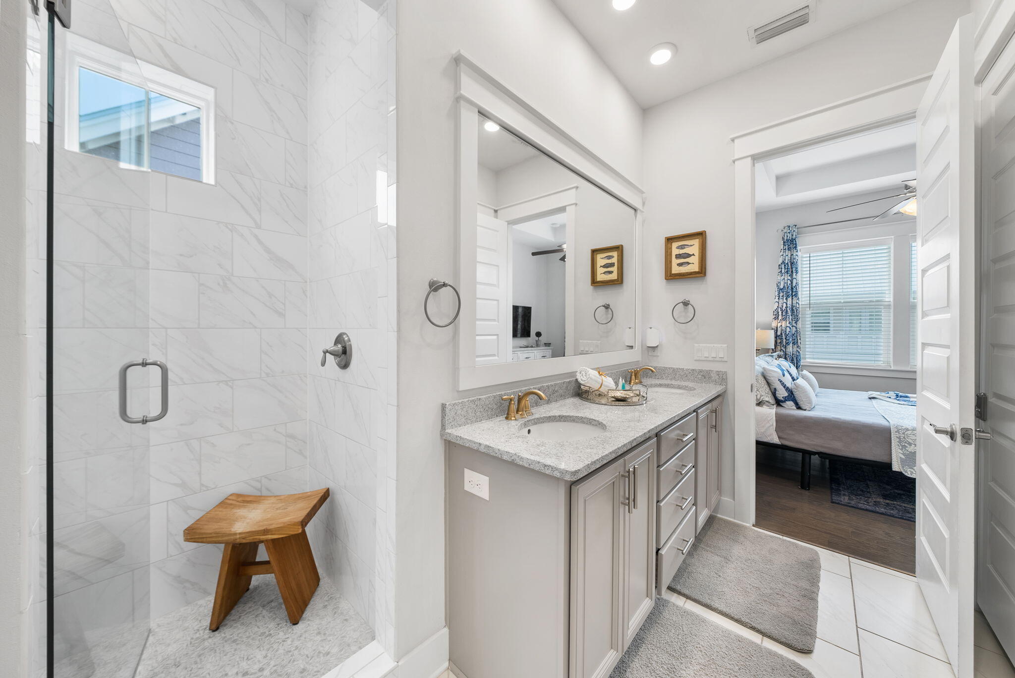 11 East E Pine, Unit C Inlet Beach, FL 32461 - Photo 21 of 40 a bathroom with a sink and a mirror