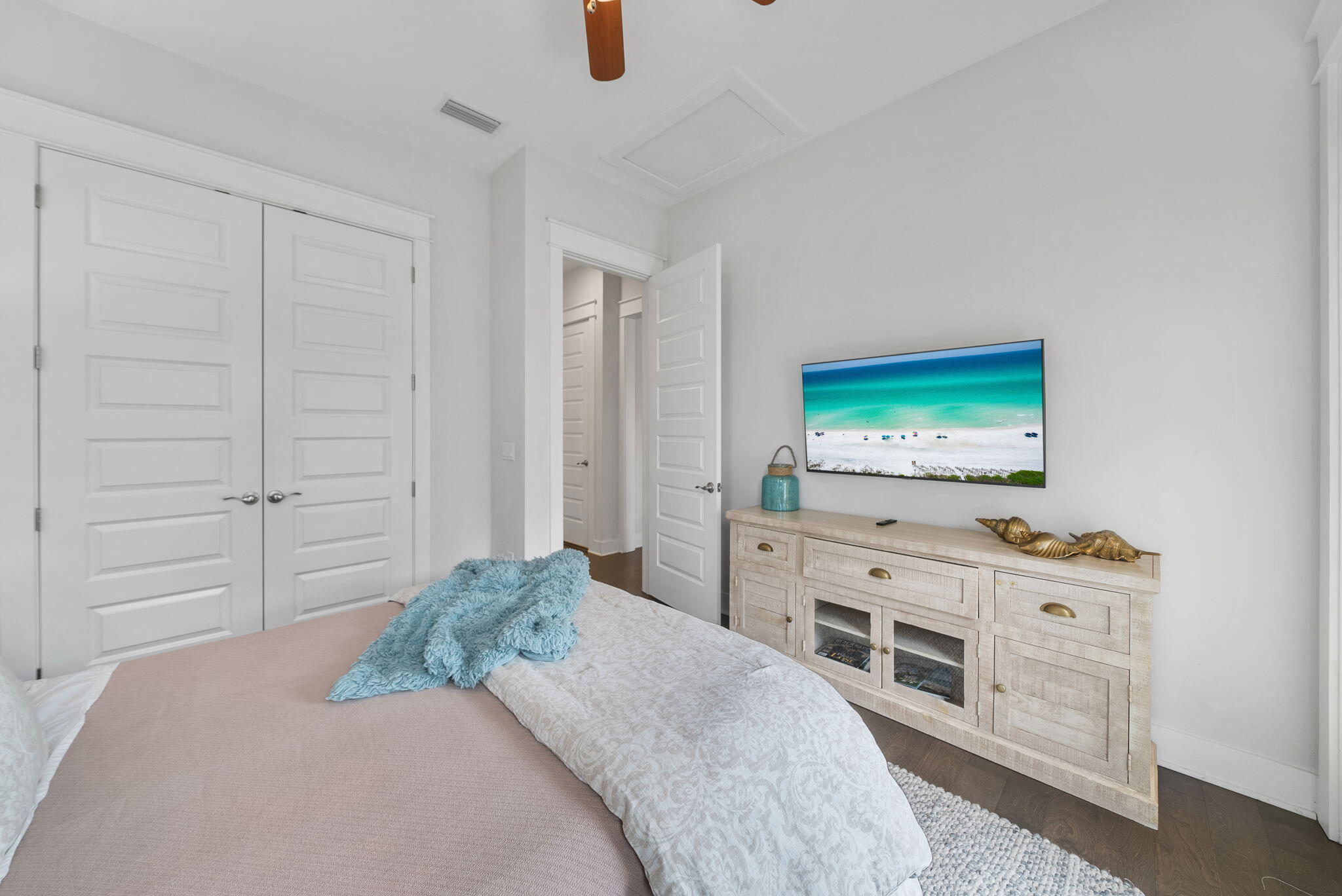 11 East E Pine, Unit C Inlet Beach, FL 32461 - Photo 23 of 40 a bedroom with a bed and a flat screen tv