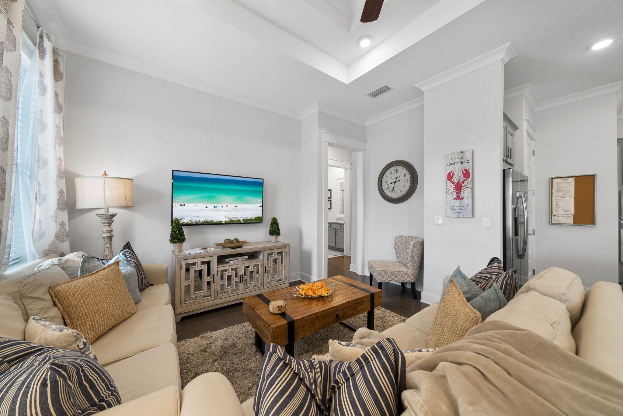11 East E Pine, Unit C Inlet Beach, FL 32461 - Photo 8 of 40 a living room with furniture and a flat screen tv