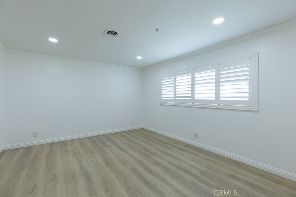 4821 Cathy Avenue Cypress, CA 90630 - Photo 8 of 21 an empty room with a window