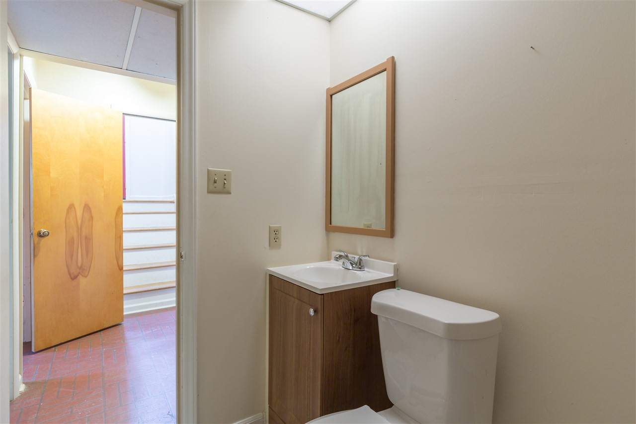 709 Merrie Road Raleigh, NC 27606 - Photo 21 of 30 This half bath is plumbed for a shower or bathtub to be added if desired. Lower Level Half Bath
