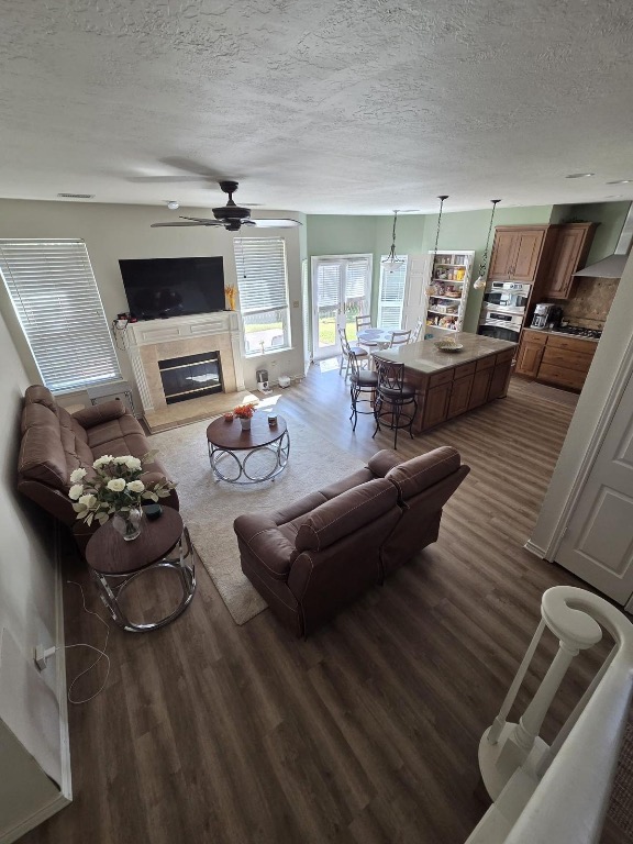 1203 Cardinal Lane Round Rock, TX 78681 - Photo 8 of 17 a living room with furniture and a flat screen tv