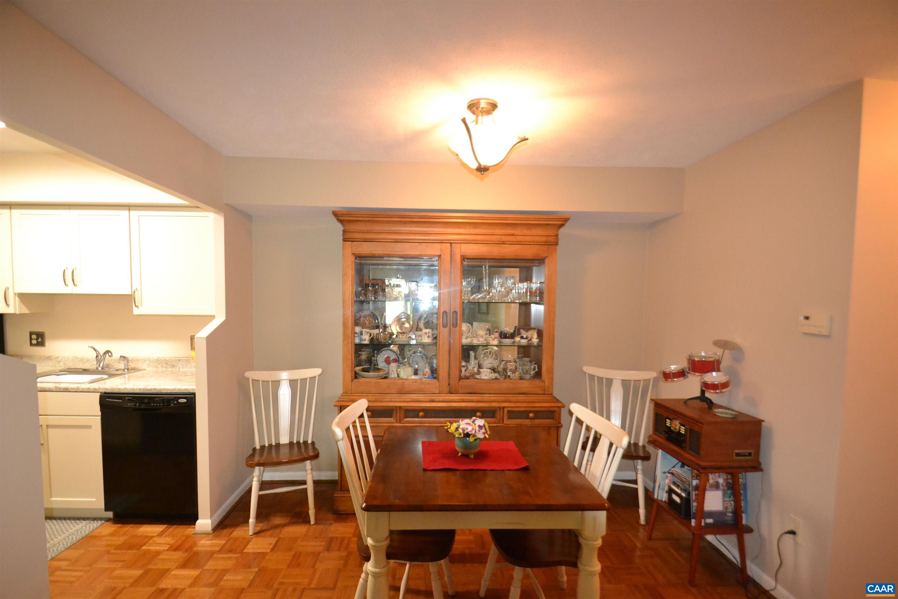 116 Turtle Creek Road, Unit 2 Charlottesville, VA 22901 - Photo 11 of 39 a dining room with a table chairs and a dining table